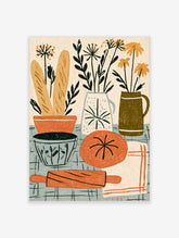 Kitchen still life poster with baguettes, rolling pin, tomato and jugs of flowers on a check tablecloth