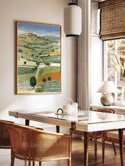 Illustrated landscape art print showing rolling green and yellow fields, trees, and a winding path under a blue sky. - Image 2