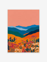 Colorful landscape wall art painting featuring blue mountains, orange fields, peach sky, and purple & white wildflowers.