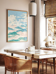 Illustrative landscape wall art print of mountains and clouds in pastel blue, green, and pink, featuring detailed line work. - Image 2