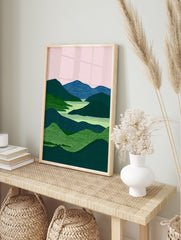 Modern landscape wall art featuring green and blue mountains, a light green river, and a pink sky with textured details. - Image 3