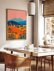 Vibrant illustrative landscape wall art with an orange wildflower field, blue mountains, pink sky, and green trees. - Image 2