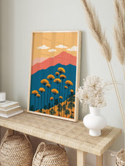 Vibrant landscape wall art painting with orange flowers, blue mountains, peach hills, and a yellow sky with white clouds. - Image 3