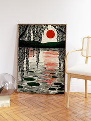 Japanese style landscape wall art with a red sun over a lake, weeping willow branches, and lily pads on the water. - Image 2