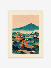 Stylized landscape wall art print depicting a mountain village with fields, trees, and houses under an orange textured sky.