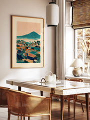 Stylized landscape wall art print depicting a mountain village with fields, trees, and houses under an orange textured sky. - Image 2