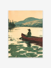 Vintage landscape wall art print of a person in a red canoe on a lake with lily pads and mountains.