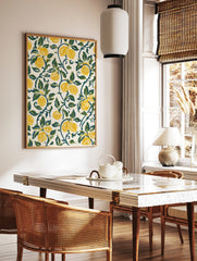 Lemon botanical art print featuring yellow fruit and green vines on an off-white background, in a styled room mockup