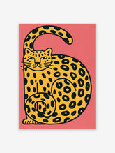 Yellow leopard with black spots curled on a pink background, modern animal art print