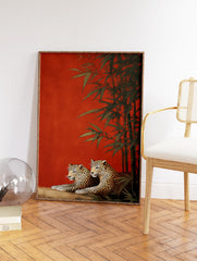 Illustration of two leopards resting among green bamboo branches against a textured red background. Leopard wall art print. - Image 2