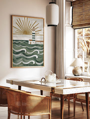 Illustrative lighthouse wall art with green and white stripes, golden sunrays, and textured green, in a styled room mockup