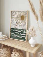 Illustrative lighthouse wall art with white and brown stripes, green ocean waves, and golden, in an alternate framed mockup