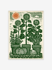 Lino-cut garden art print with sunflowers, potted herbs, pumpkin, and cabbage on a brick wall under a sun