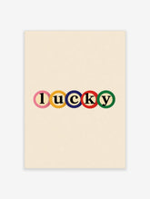 Lucky typography wall art print with colourful letters in circles on a neutral background
