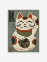 Maneki Neko cat print with raised paw, red collar, kanji bell, on textured grey background