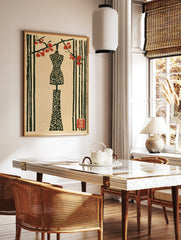Japanese-style woodblock print of a mannequin under a red flowering branch on a neutral paper, in a styled room mockup
