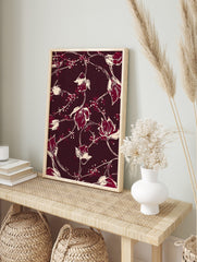 Maroon background with off-white and red illustrative floral vine pattern print, in an alternate framed mockup