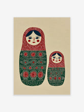 Matryoshka doll folk art print featuring two red and green decorated nesting dolls on a textured beige background.
