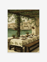 Painting of an outdoor dining table under a green pergola overlooking a Mediterranean coastal town and turquoise water.