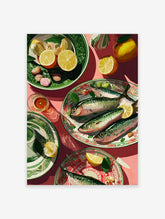 Vibrant illustrative fish wall art print of fresh sardines, lemon slices, and decorative plates on a pink table.
