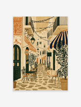 Mediterranean street poster of cobbled alley with cafe tables, striped awnings and potted olive trees