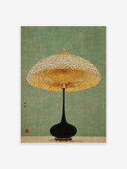 Minimalist lamp wall art with a golden textured shade and black base on a green background, with Japanese text and a red