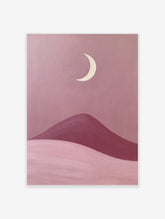 Minimalist moon landscape art print featuring a cream crescent moon above rolling pink and berry desert dunes