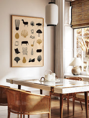Minimalist grid illustration print with botanical, animal, and household icons in black on a beige, in a styled room mockup