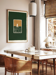 Minimalist sailboat art print with white boat on dark green sea and tan sky, illustrative style, in a styled room mockup