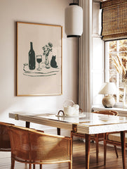 Minimalist still life wall art featuring a dark green illustration of a bottle, wine glass, flowers in a vase, and a cat silhouette. - Image 2