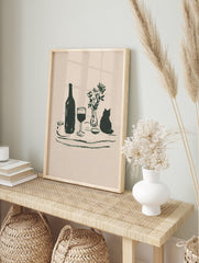 Minimalist still life wall art featuring a dark green illustration of a bottle, wine glass, flowers in a vase, and a cat silhouette. - Image 3