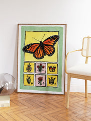 Monarch butterfly illustration with small folk art motifs on a yellow background with a green border. - Image 2