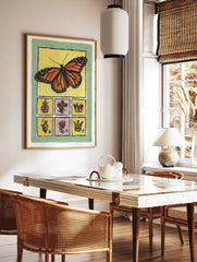 Monarch butterfly illustration with small folk art motifs on a yellow background with a green border. - Image 3