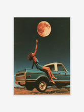 Surreal art print of a person reaching for a glowing moon from a floating vintage blue pickup truck in a desert landscape