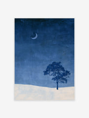 Minimalist wall art print of a single tree and crescent moon over a snowy landscape in deep blue and white