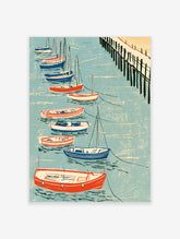 Illustrative print of small boats moored beside a wooden pier on water in a blue, red, and white palette