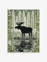 Moose silhouette standing in a forest lake with tall trees and birds in a green and white linocut style print