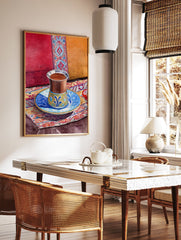 Watercolor painting of a Moroccan tea cup on a patterned rug with red and orange cushions in the background. - Image 3