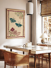 Illustrative Moth & Floral Wall Art print featuring two teal moths, red and green flowers, and a patterned border on a beige background. - Image 2
