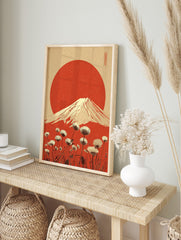 Illustrative Mount Fuji with red sun and white dandelion flowers against a textured beige and, in an alternate framed mockup