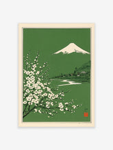 Japanese landscape art print with Mount Fuji, white blossoms, and a village on a green background