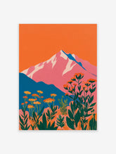 Vibrant mountain wall art with pink peaks, orange sky, teal hills, and foreground of orange botanical flowers and green leaves.