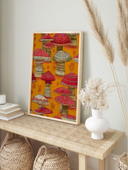 Vibrant red mushroom wall art with intricate tribal patterns on caps and stems, set against a warm orange background. - Image 3