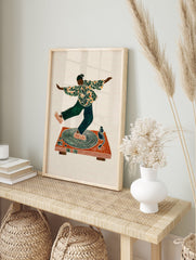 Illustrative music wall art print featuring a dancer in green and orange patterned clothing on a brown turntable. - Image 3