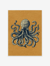 Navy blue octopus illustration with cream detailing on a mustard background, vintage style art print
