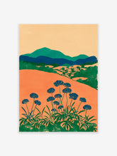 Modern botanical wall art print with orange fields, green mountains, and blue flowers on long stems against a light background.