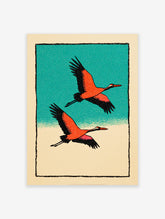 Two orange and black cranes flying against a teal sky and beige ground, in a Japanese illustrative wall art print.