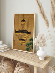 Ornate golden chandelier with many lantern-like elements hanging from chains, with green, in an alternate framed mockup