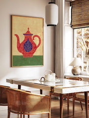 Ornate red teapot illustration with blue lid and central leaf motif, on a beige background with, in a styled room mockup