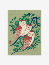 Japanese style illustration art print of three white and red owls perched on a blue branch with green leaves.